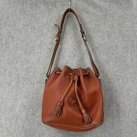 Dooney & Bourke Handbags - VTG DOONEY & BOURKE Tan Brown Bucket Bag Purse All Weather Leather‎ Shoulder